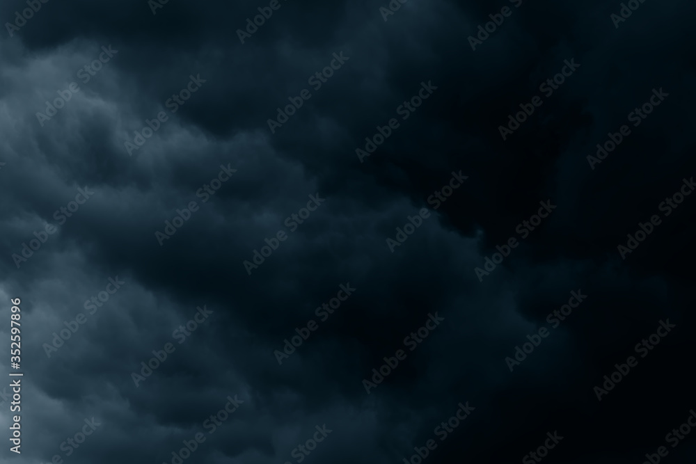 Stormy rain big fluffy clouds. Dark sky. Natural scenic abstract background. Weather changes backdrop. Sky filled with voluminous clouds.