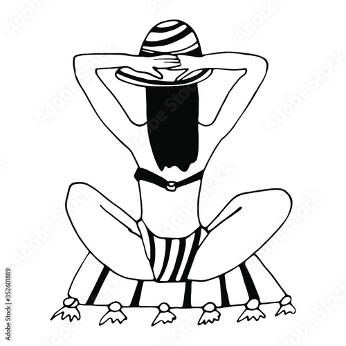 Glamorous Woman resting on the beach in yoga pose Glamorous Woman resting on the beach in yoga pose 