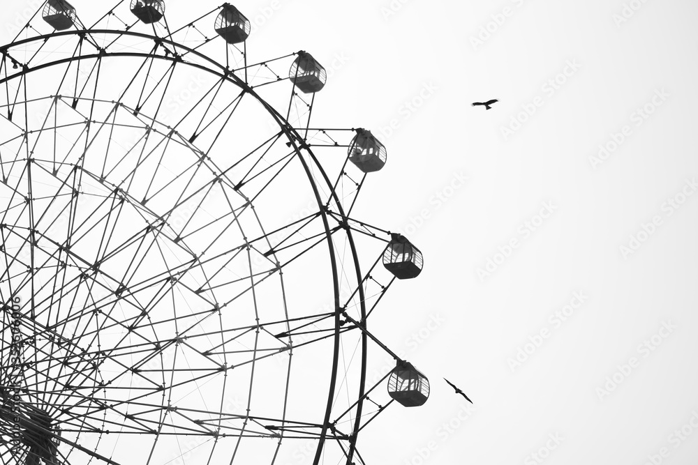 Low Angle View Of Giant Wheel Against Clear Sky - obrazy, fototapety, plakaty 
