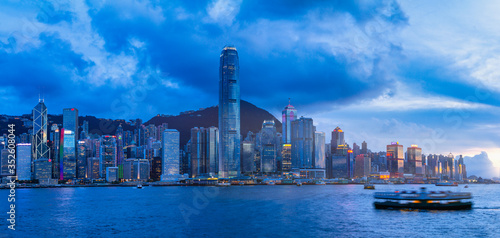 HONG KONG  CHINA - July 4  2014  Coming twilight between the skyscrapers of Victoria Peak  Hong Kong on July 4  2014