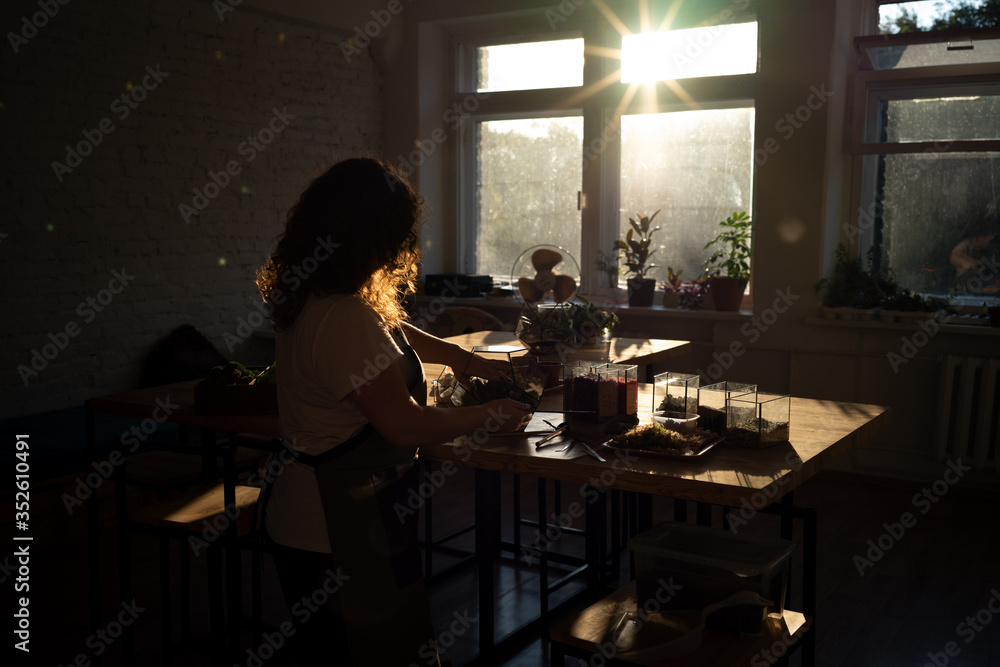 Fototapeta premium Girl Making Florarium