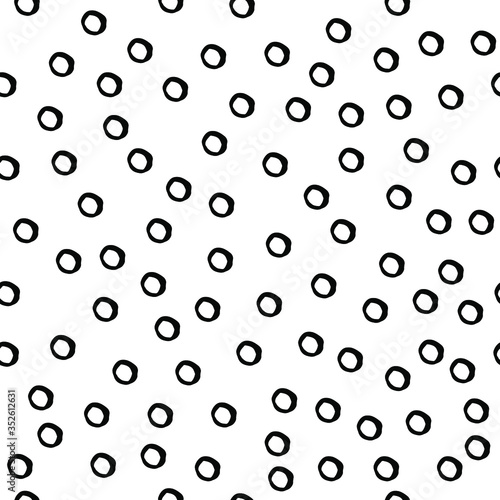 Pattern of uneven circles and ovals. Round shapes drawn by hand. Black-white seamless texture. Abstract shapes line. Vector stock composition. © Tetiana