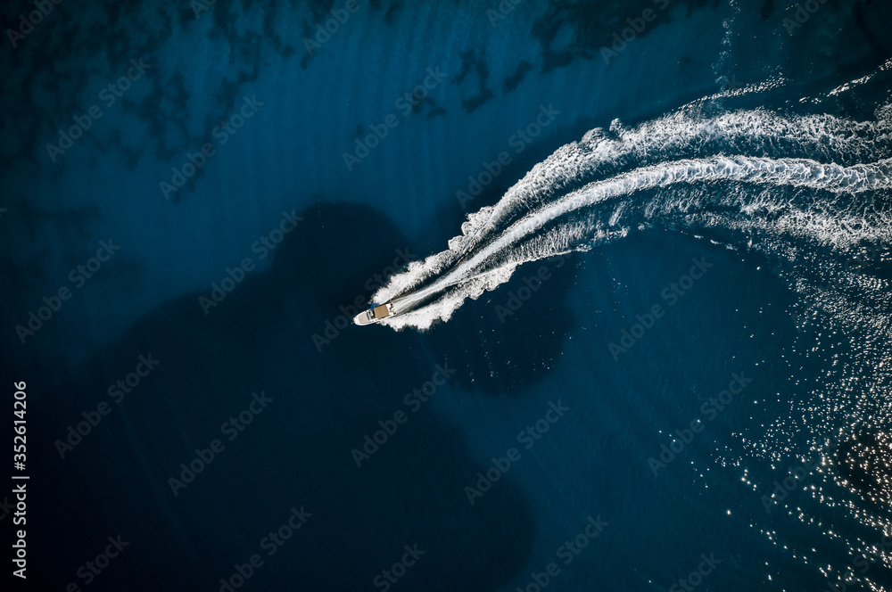 Speed boat in mediterranean sea, aerial view - obrazy, fototapety, plakaty 
