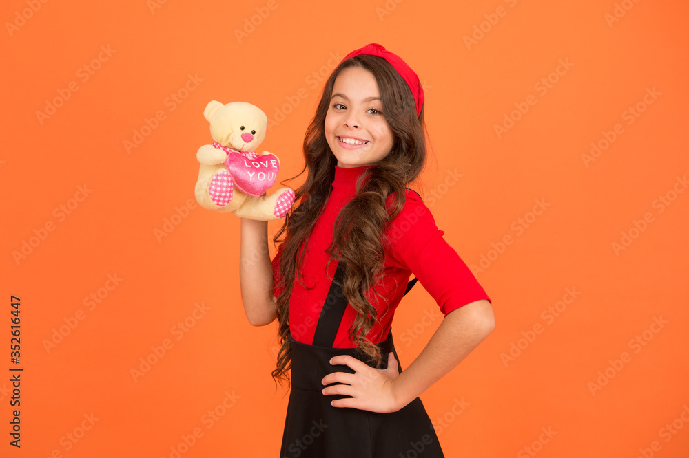 Emotional intellect. Lovely child. Childhood concept. Lovely small girl smiling happy face hold toy. Happy childhood. Imaginary friend. Little girl play with soft toy teddy bear. Child care Emotional intellect. Lovely child. Childhood concept. Lovely small girl smiling happy face hold toy. Happy childhood. Imaginary friend. Little girl play with soft toy teddy bear. Child care