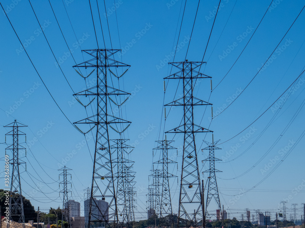 power transmission towers and blue sky