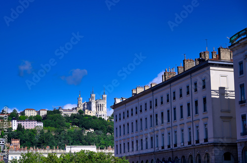 The Basilica of Notre Dame de Fourviere overlooking Lyon, France and the Saone River. © Jbyard