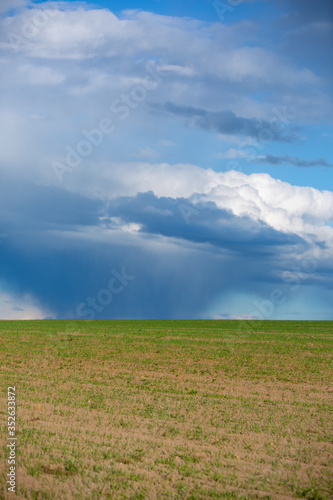 Dark clouds over field before a tunderstorm