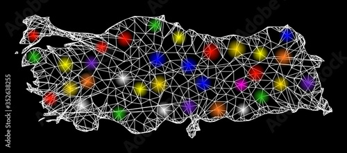Web mesh vector map of Turkey with glare effect on a black background. Abstract lines, light spots and dots form map of Turkey constellation.