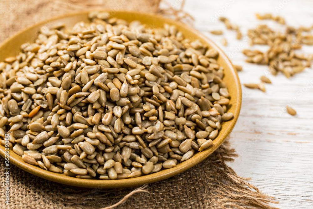 Sunflower Kernels Roasted Seeds Background. Selective focus. Sunflower Kernels Roasted Seeds Background. Selective focus.