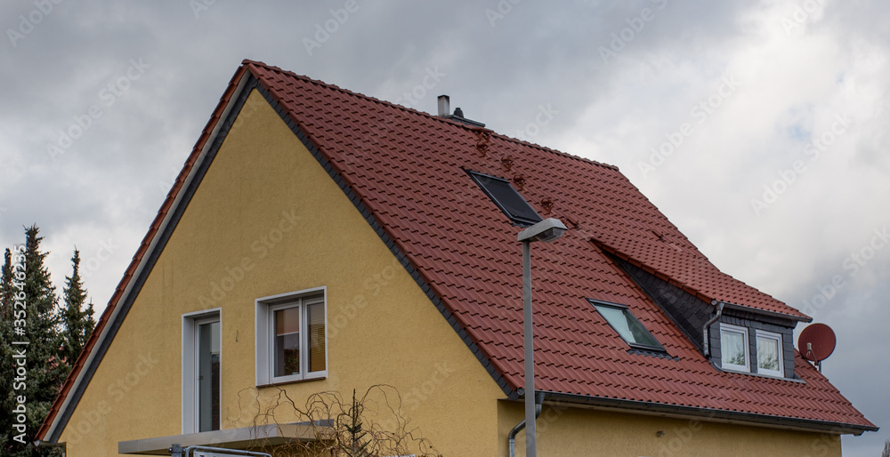 the roof of the house with window