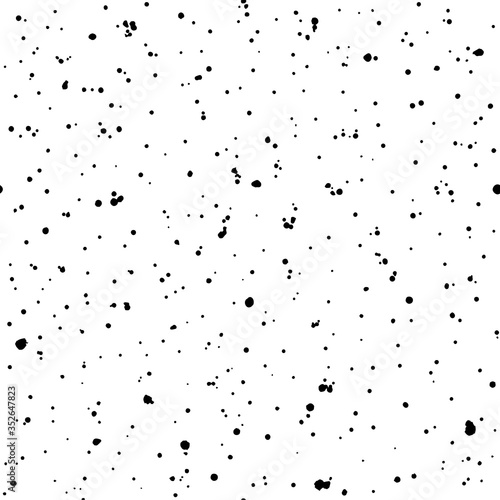Black and white ink splash, spatter, chaotic grunge splatter, blots hand brush drawn seamless pattern. Paint spray, blobs vector background, uneven dots, tiny flecks, specks, spots texture.