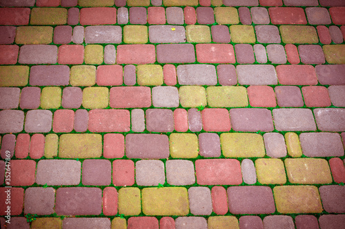 Background texture, paved street. Paving stones. Stone street cobblestones. Paving bricks. photo