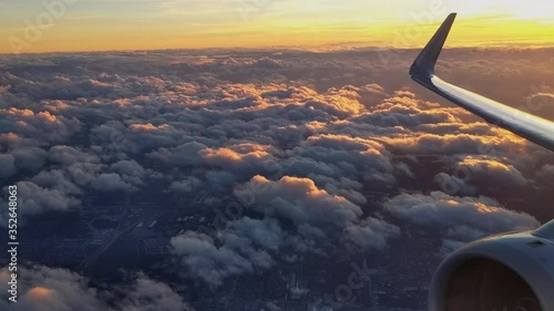 Wallpaper Mural Early morning flight at relatively low altitude over lower stratus clouds. Torontodigital.ca
