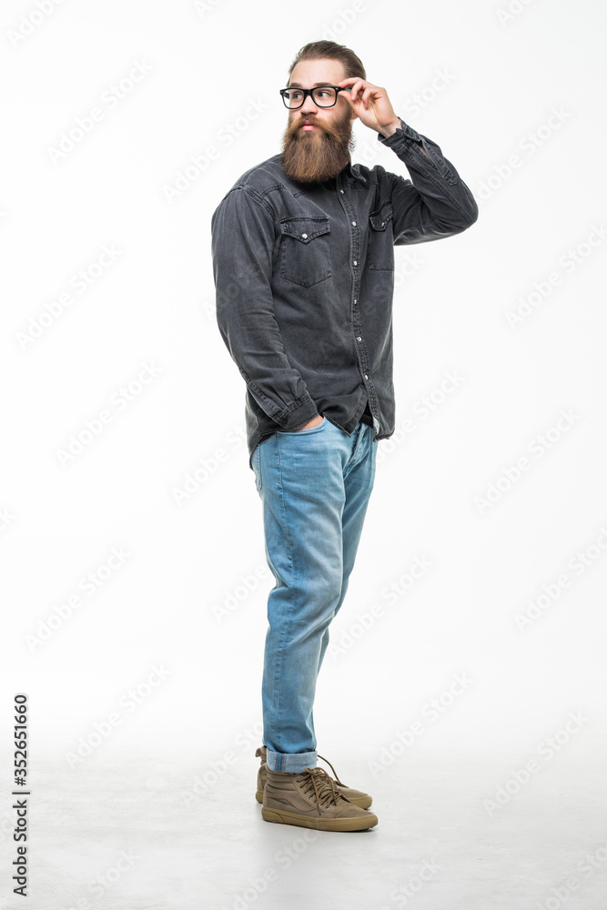 Full body length portrait long bearded hipster man isolated over white background. Full body length portrait long bearded hipster man isolated over white background.
