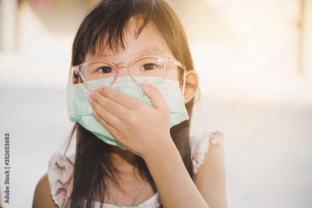 Kids wearing the mask for protect them self from virus and air pollution. Prevention by mask to reduce spread of the coronavirus