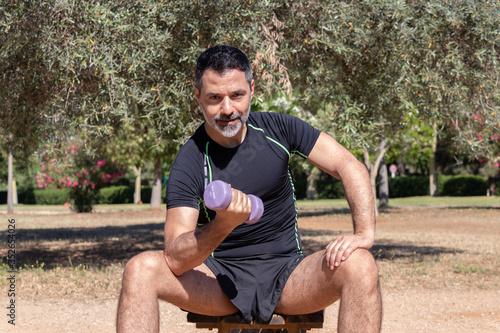 Sporty man trains at the park © Stefano Piazza