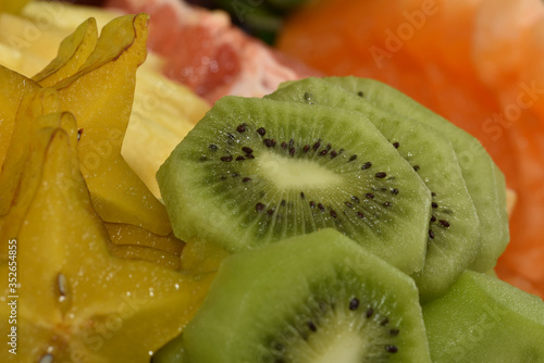 Macro shot of a kiwi Sliced kiwi macro.