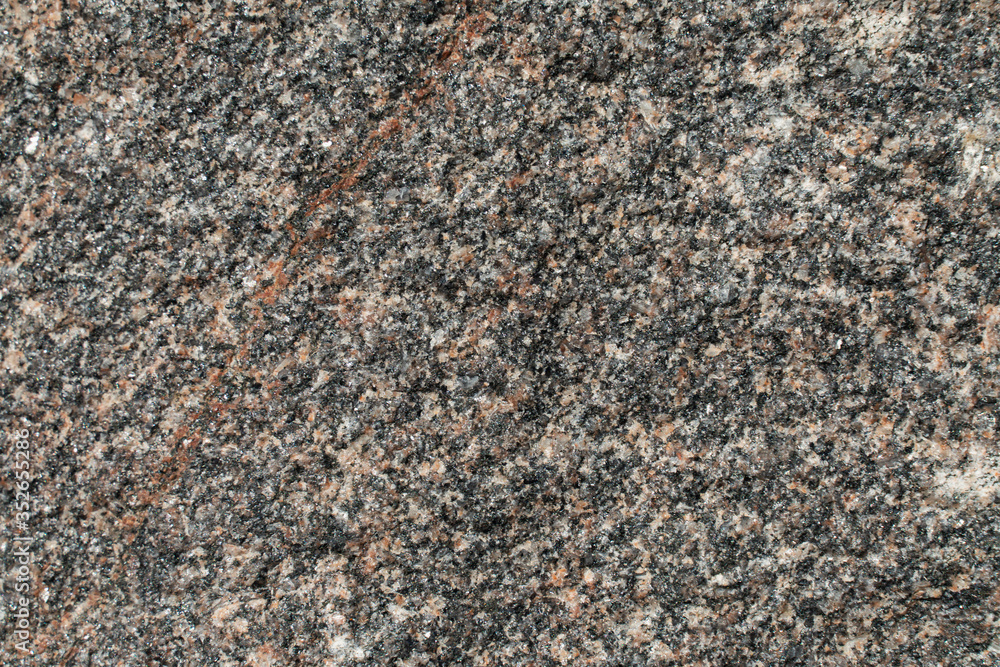Stone Background texture of mottled granite igneous rock Stone Background texture of mottled granite igneous rock
