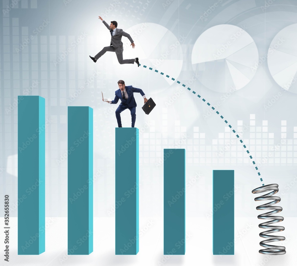 Businessman outperforming his competition jumping over Businessman outperforming his competition jumping over