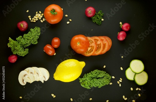 Fototapeta Naklejka Na Ścianę i Meble -  fresh vegetables on black background