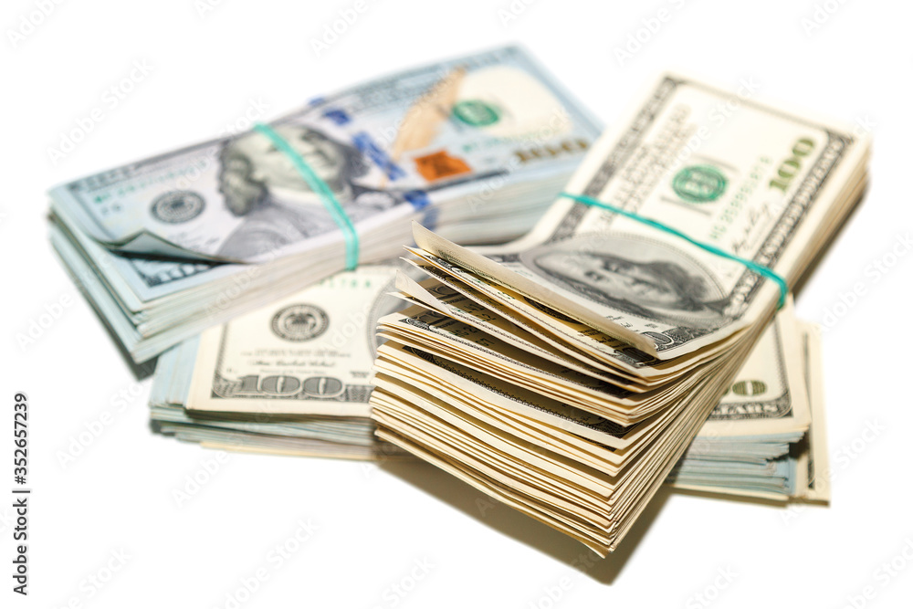 Bundles of money dollar bills isolated on a white background Bundles of money dollar bills isolated on a white background