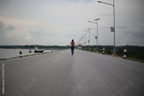Women standing on the reservoir road