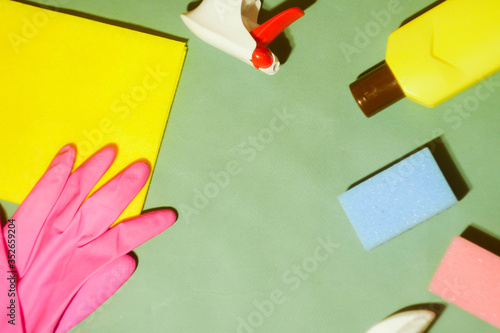 Cleaning products background. Housekeeping equipment flat lay. Copy space photo