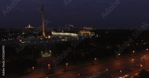 Victory Park 4K night aerial video with background view of Moscow City Business Center, Kutuzovskiy Avenue busy road traffic, memorial complex in Poklonnaya Hill, near Moscow River in Moscow, Russia