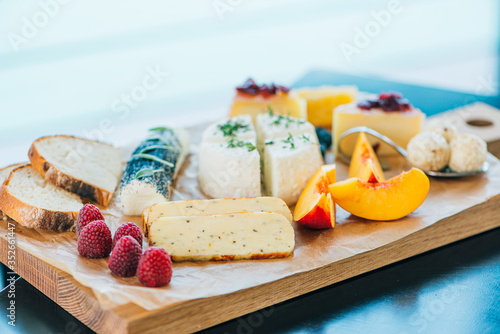 Various kinds of fresh cheese on the plate
