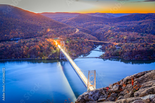 The Bear Mountain Bridge, ceremonially named the Purple Heart Veterans Memorial Bridge, is a toll suspension bridge in New York State. photo