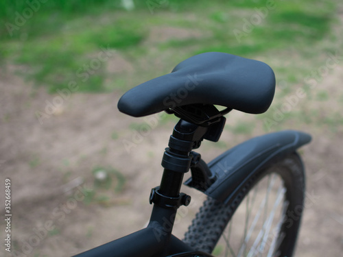 Bike seat, Bicycle saddle on green background