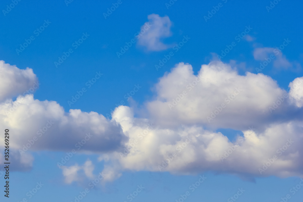 texture of fluffy clouds against a blue sky and fresh air