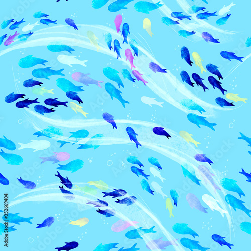 Watercolor seamless pattern with colorful fish and waves on a blue background. Texture with oceanic creatures for wallpaper, packaging, scrapbooking, fabrics, textiles