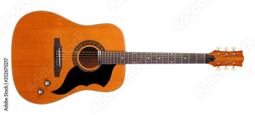 Musical instrument - Front view vintage acoustic guitar. Isolated