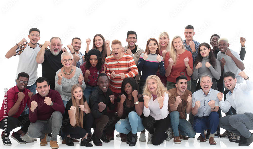 Multiethnic group of excited people with arms up isolated on whi