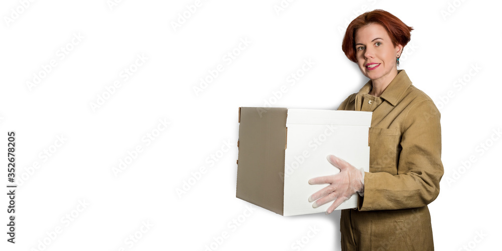 Delivery woman employee in uniform gloves hold empty cardboard box. Banner Delivery woman employee in uniform gloves hold empty cardboard box. Banner