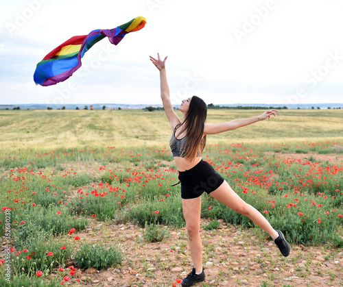 a beautiful girl with the pride flag on 2020