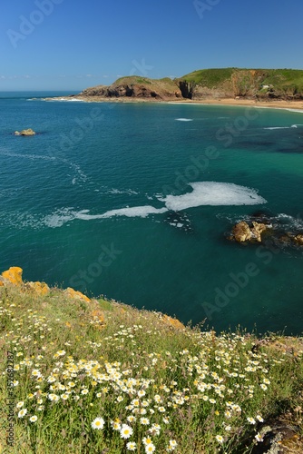 Plemont Bay, Jersey, U.K. Picturesque beach and cliffs in the Summertime.