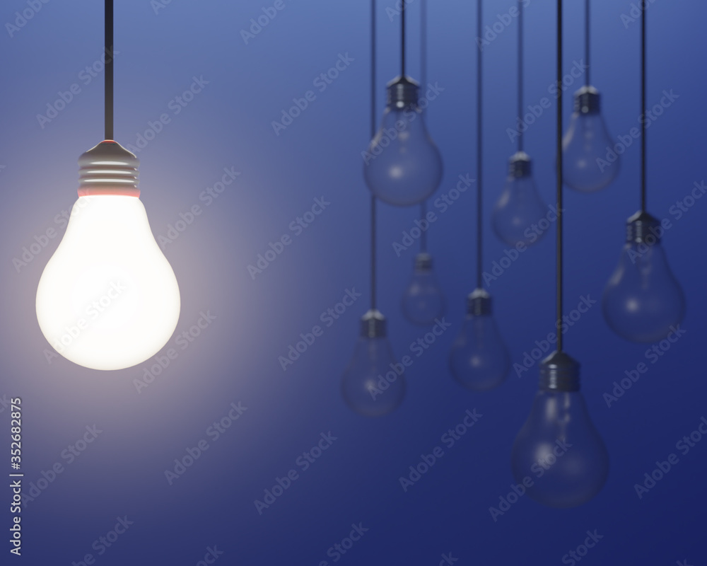 Lit Light bulb on Blue Background Lit Light bulb on Blue Background