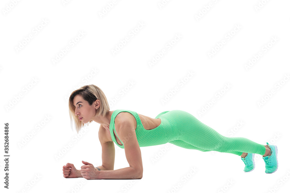 Fit slim woman doing yoga exercise called Plank Pose, sanskrit name: Kumbhakasana, pose strengthen wrists, arms, shoulders, back, legs, and abdomen, lengthens the spine, isolated on white.