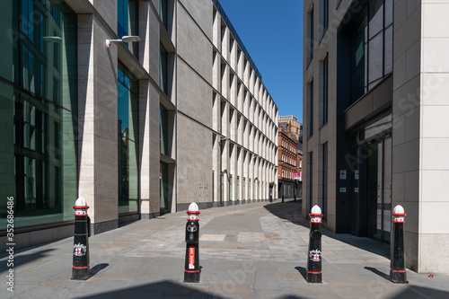 Empty London Streets during Coronavirus COVID-19 Lockdown with City of London Traditional Barriers