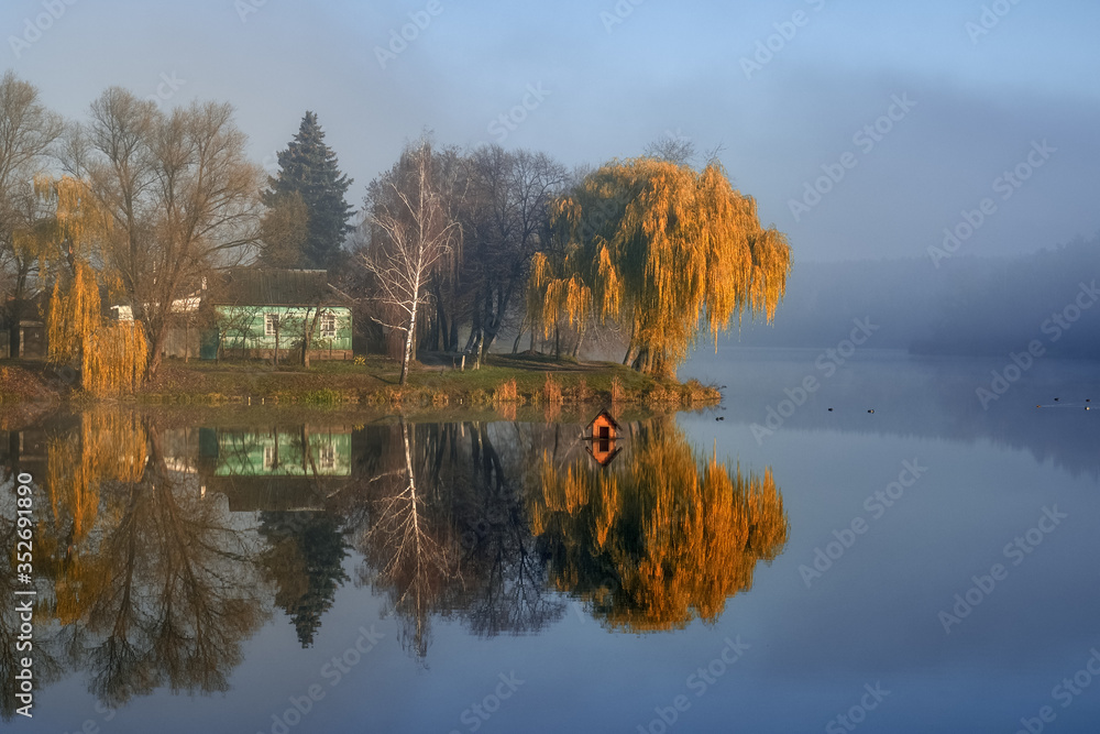 autumn landscape with lake and trees