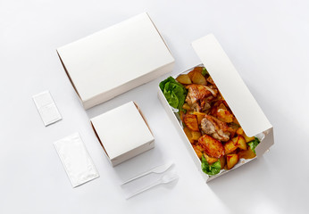 white take away box with chicken and hamburger