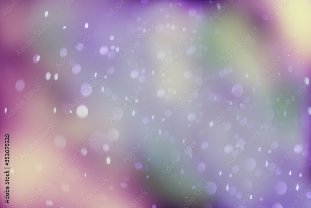 spring background. purple magenta defocus bokeh background. Drops of dew or rain. Design element.drops of flying rain.