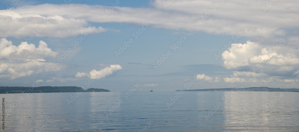 Sailboat between Bainbridge island and Shoreline Sailboat between Bainbridge island and Shoreline
