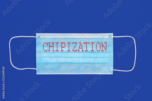 surgical mask as a symbol of infectious diseases with the inscription CHIPIZATION photo