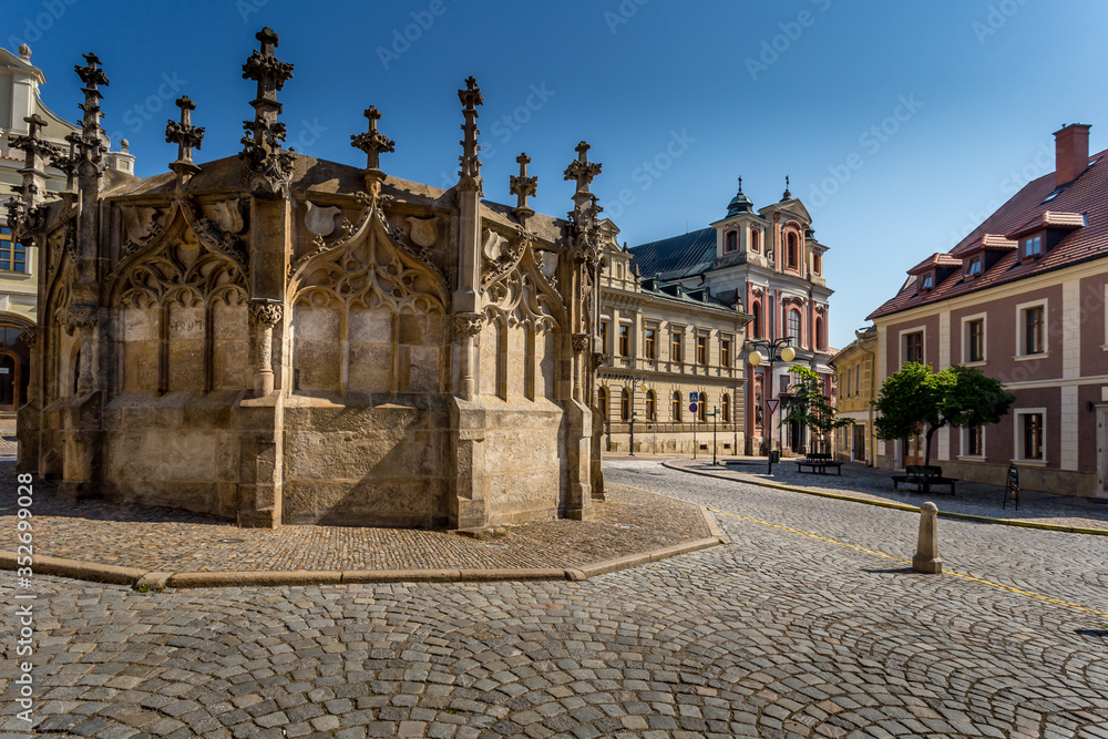 Picturesque historic city. Gothic stone fountain located on square in historic city. World Heritage Site by UNESCO. Kutna Hora, Czech Republic