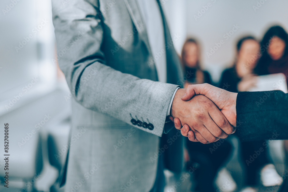close up. handshake of business people in the office.