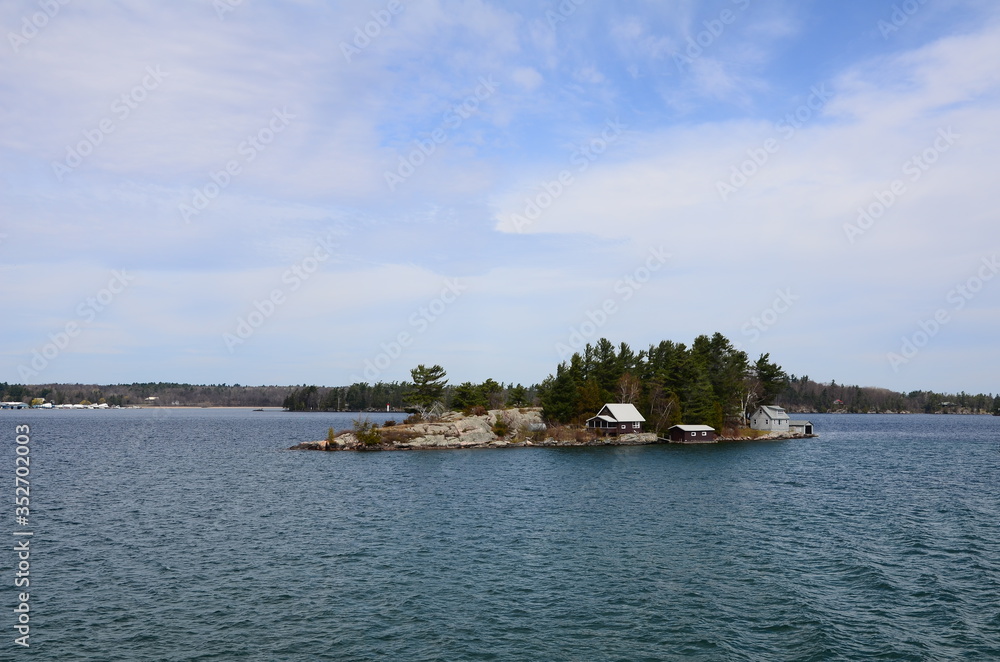 One Island in Thousand Islands Region in fall of New York State, USA