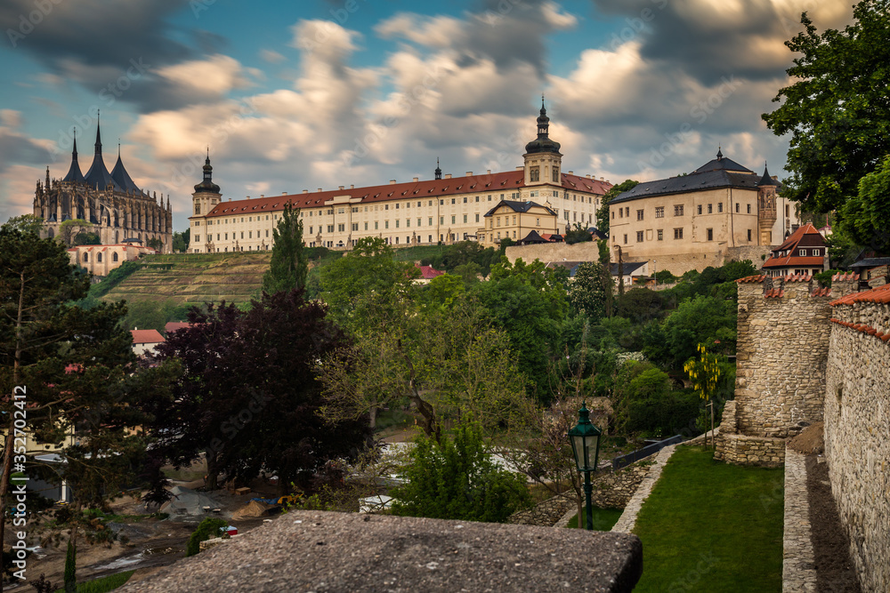 Fototapeta premium Dawn with dramatic sky. Panorama city of kutna Hora. The Cathedral of St Barbara and Jesuit College in Kutna Hora, Czech Republic, Europe. UNESCO World Heritage Site